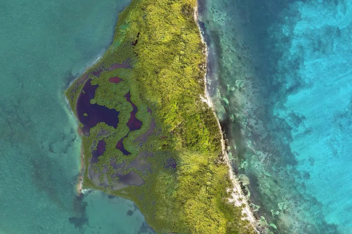 Aerial view of the northern tip of Ambergris Caye — Bacalar Beach surrounded by Caribbean reef